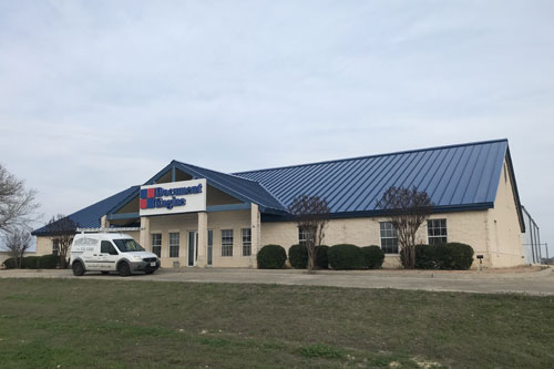 Row of brick apartments.