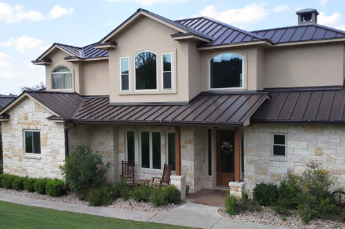 Large living room windows with white frame.