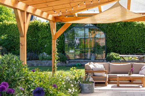 Fresh wooden patio with flowers.