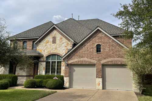 Brick house front lawn view