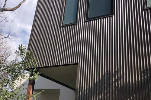 White paneled vertical siding